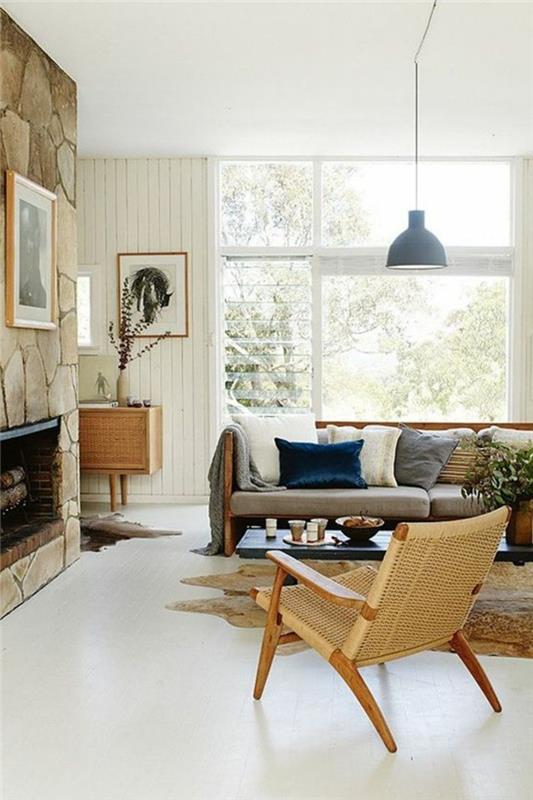 idea-maľba-obývačka-veľké-okno-obývačka-sedačka-nízke-vankúše-ratanová stolička