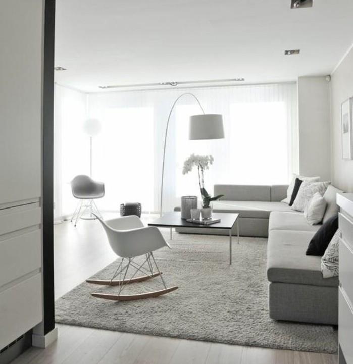 Colori per pareti soggiorno, salotto con tappeto grigio, sedia a dondolo di colore bianco