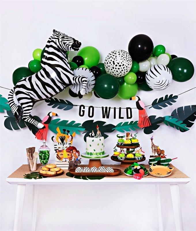 barnfödelsedagsdekor på djungeltemat, 1 års födelsedagsväggdekor med en båge av gröna ballonger och zebra och tropiska bladkrans i papper