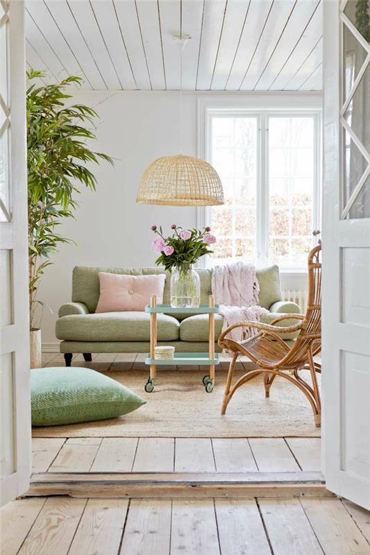 hur man ordnar det vita vardagsrummet, med vilka färger att associera gröna, dekorativa föremål i pastellrosa