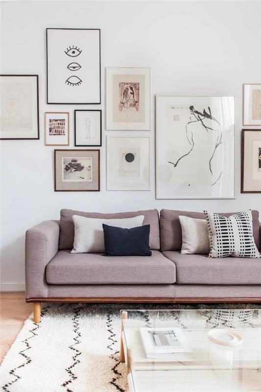 Dekorácia obývačky v škandinávskom štýle, minimalistické švédske deco, moderná ružovo -šedá sedačka