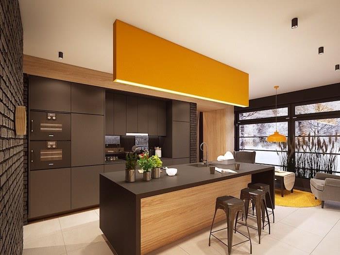 kökinredning, svart tegelvägg, vita golvplattor med gul rund matta