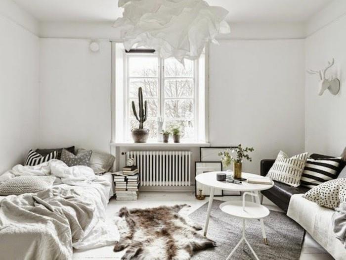 pekná spálňa s dekorom nordi-biela-čierna-nábytok-severský-koberec-škandinávska kancelária