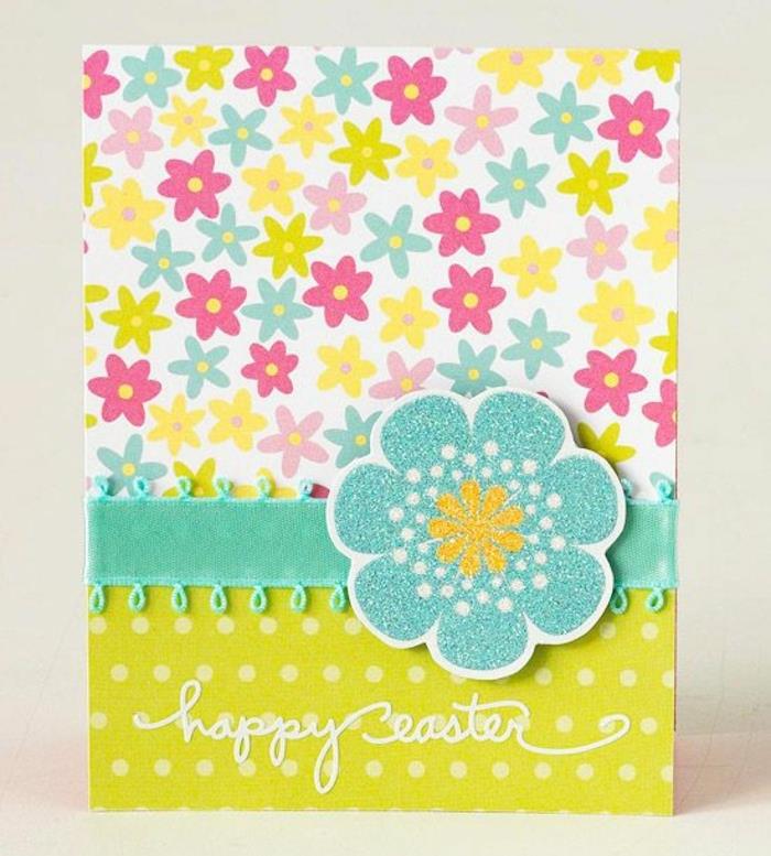 glad påsk, mångfärgat gratulationskort med blommönster, stor blå blomma, blått band, påskhantverksaktivitetsidé