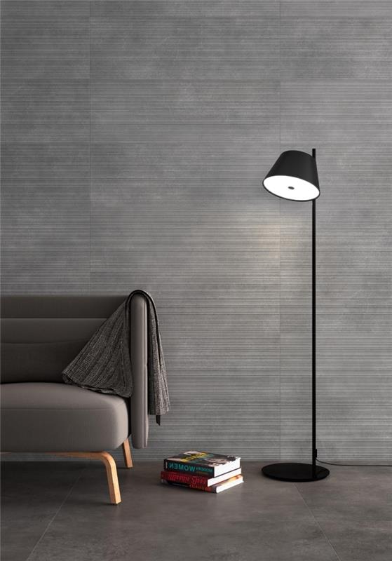 val av tillbehör och föremål för snygg vardagsrumsinredning i minimalistisk anda med en matt svart golvlampa