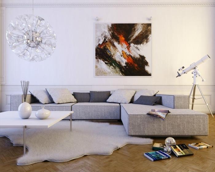 abstrakt konst, vita väggar, grå hörnsoffa, grå sovrumsväggar, trägolv, vitt soffbord
