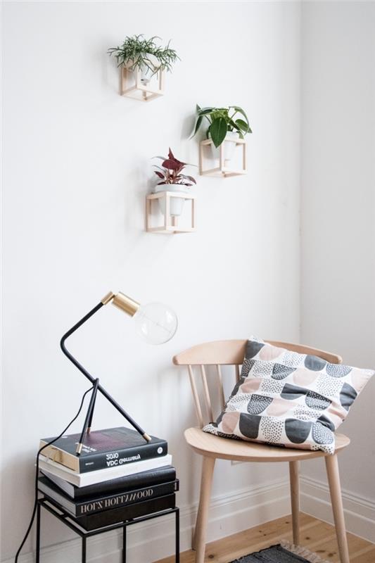 modern inredning av minimalistisk anda i ett trä- och vitt rum, idé om växt som hänger på väggen