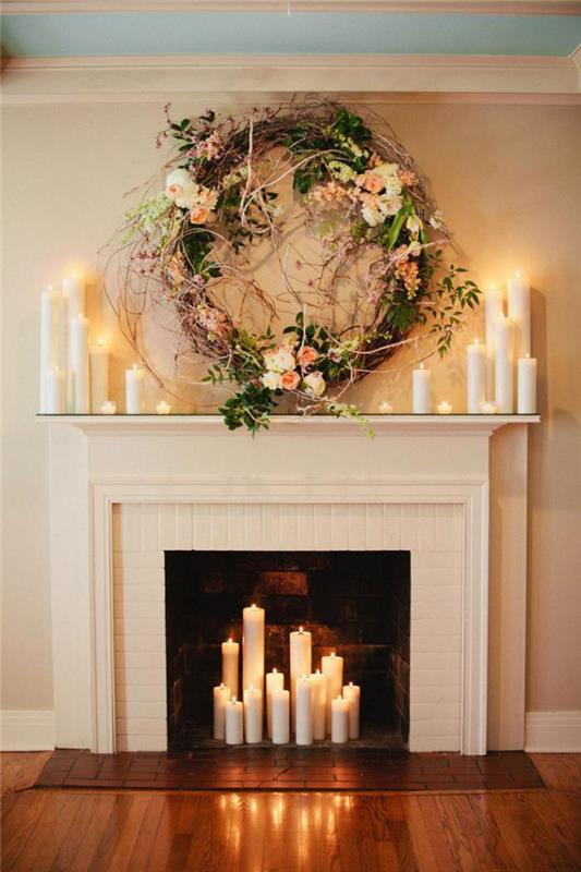 الموقد الأبيض عباءة الشكل الكلاسيكي الأزهار الديكور والشموع الجميلة