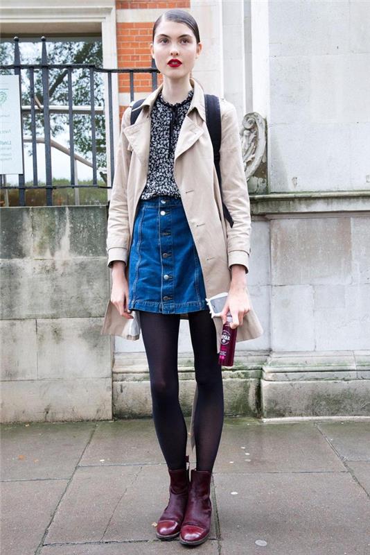 vintage a preppy look s dámskym béžovým kabátom, riflovou sukňou vpredu na zapínanie a kvetovanou košeľou so zaväzovacím golierom