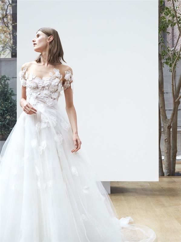 فكرة فستان الزفاف الأصلي مع صد من الأوراق البيضاء وتنورة من التل والزهور المطرزة