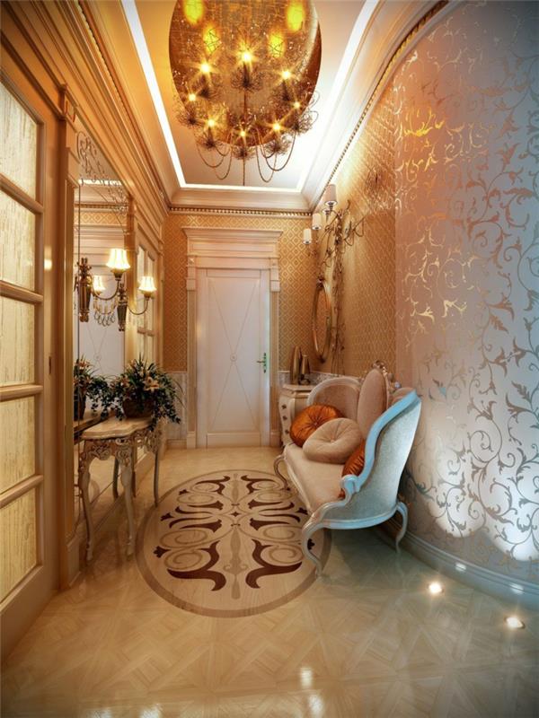 قاعة المدخل مع كونسول المدخل الباروكي ، وأريكة الباروك باللون الأبيض ، ومصباح السقف الأنيق الفاتن ، وورق الحائط بزخارف نباتية