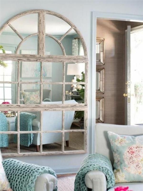 stor-vägg-spegel-fönster-spegel-soffa-ljusblå