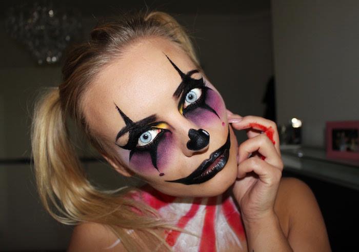 kvinnlig clown ögonmakeup för halloween