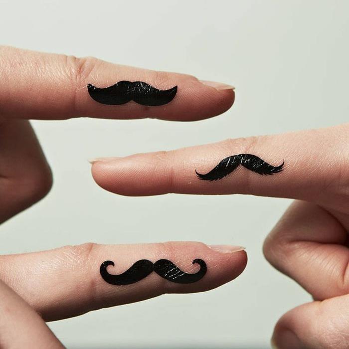 minimalistisk tatueringskonst, tatuering på mustaschfinger