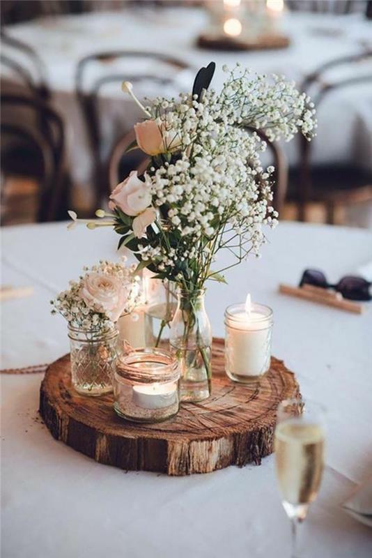 Dekorativt bord i trä och lantliga blommor, rustik chic bröllopsinspiration, original rustik bröllopsborddekoration