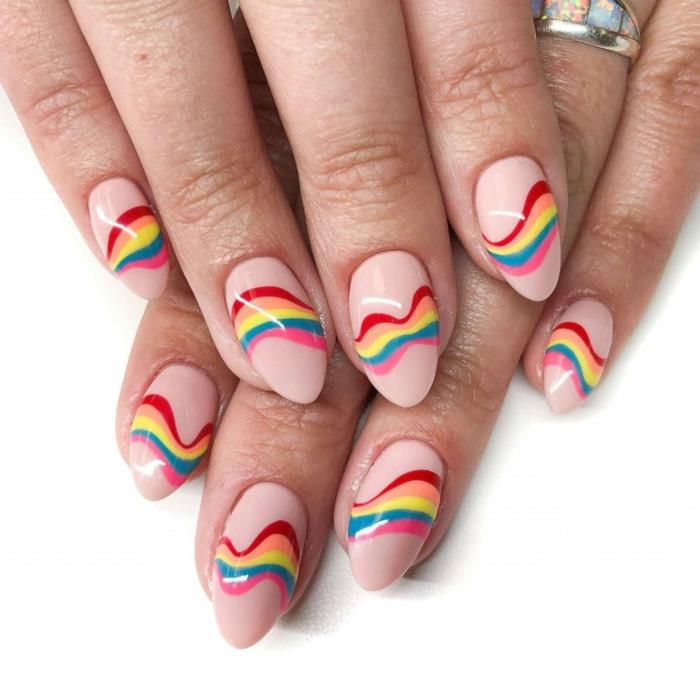 Rainbow nail art idé, rosa naglar med regnbågsmönster, ring, mandelformade naglar