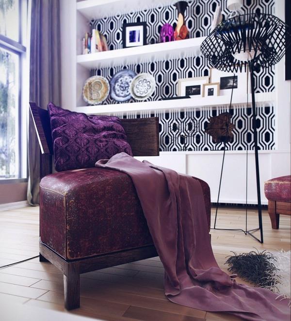 grafisk-tapet-och-en-stor-läder-soffa