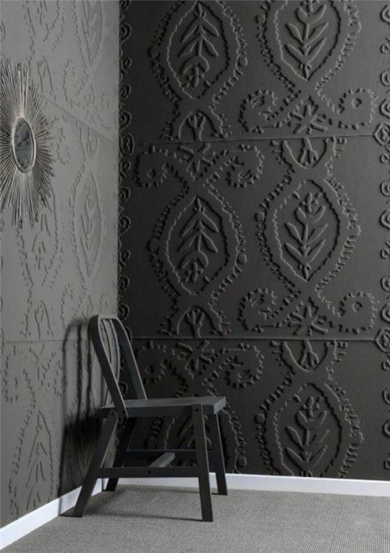 trompe l'oeil tapeter, mörkgrå väggar, blommönster och bladprydnadsmönster, häxspegel i form av en sol på väggen, grå matta på golvet