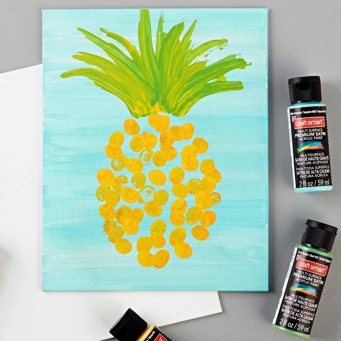 måla i akryl med fingrarna för att göra en vacker ananas på duk, ananasmålning på duk