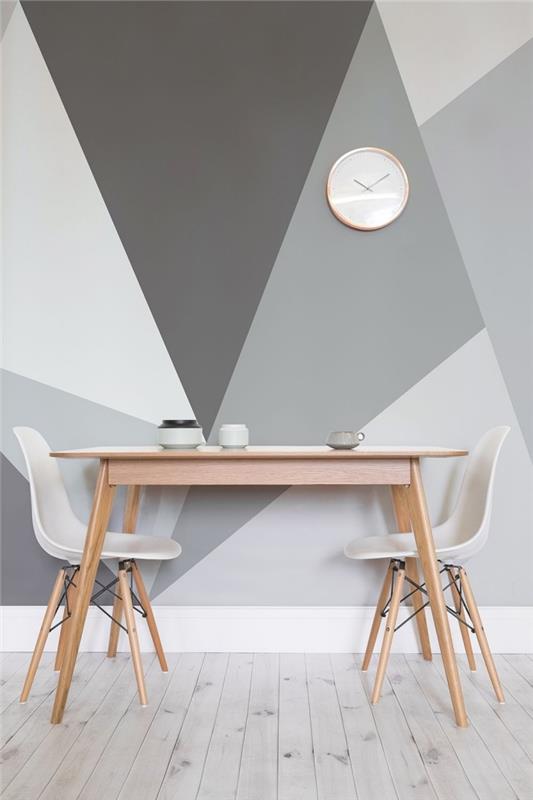 obraz stena trojuholník hodiny dekorácia malá jedáleň stôl svetlo drevo biela stolička parkety podlaha svetlo šedá laminátová podlaha