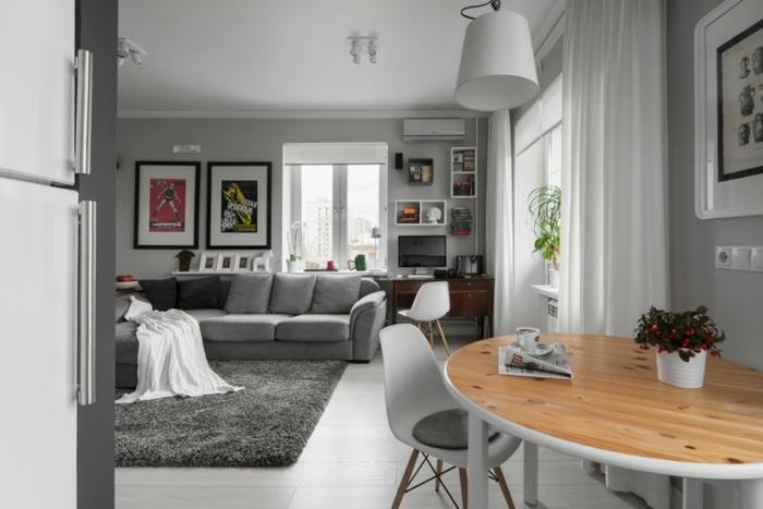 grå och trä matsal inredning, grå matta, trä och vitt ovalt bord, skandinaviska stolar, ljusgrå väggfärg
