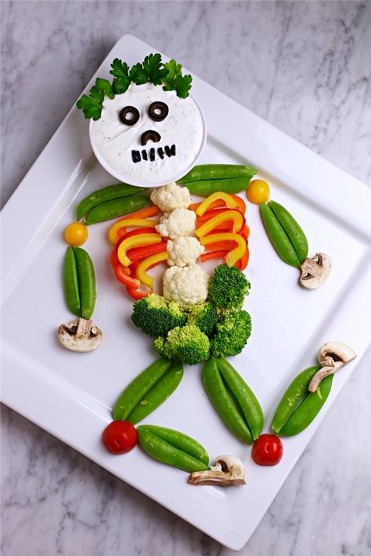 skelettformade råa grönsaksfat, bantningsrecept för halloween-middagsapetern