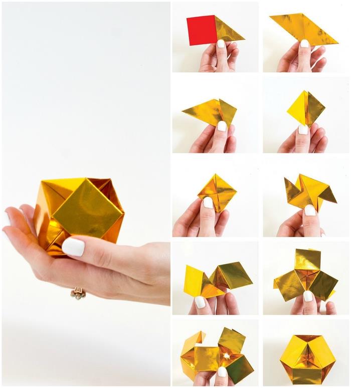 pekný model origami v tvare malého drahokamu z metalického farebného papiera, ktorý môžete použiť na výzdobu interiéru