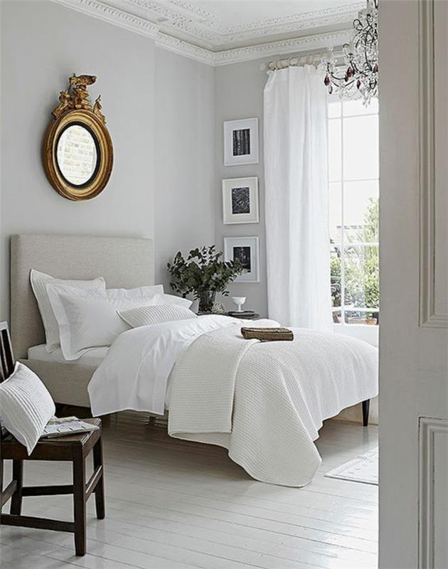 pärlgrått sovrum vit kristallkrona oval spegel med gyllene ram Empire -stil