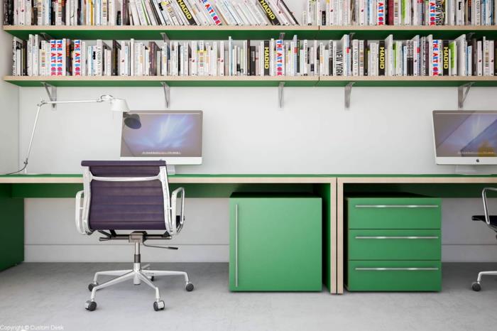 nábytok prepracovaný zelenou farbou, pracovný priestor s veľkou pracovnou doskou natretý na zeleno, drevená skrinka s počítačmi Apple