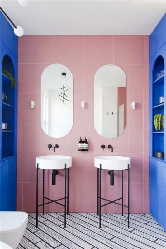 originálny nápad na farbu WC, vzor obkladačiek v ružovom odtieni v kombinácii s bielou a matnou čiernou skrinkou pod umývadlo