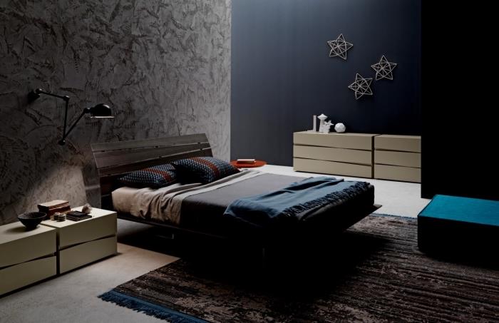 sovrumsdekoration i mörka färger, väggfärg i antracitgrått, designade trämöbler