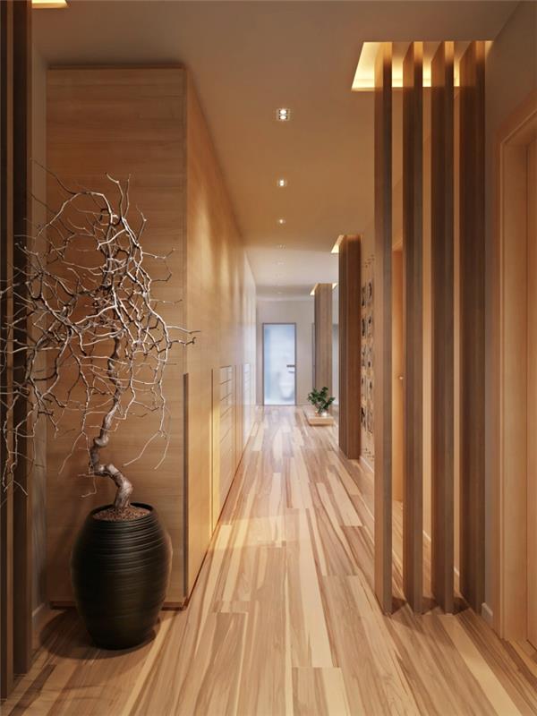 moderný a teplý trend dekorácie interiéru nábytkom a obkladmi stien a svetlou drevenou podlahou, zelenými rastlinami a sušeným stromom v čiernom kvetináči