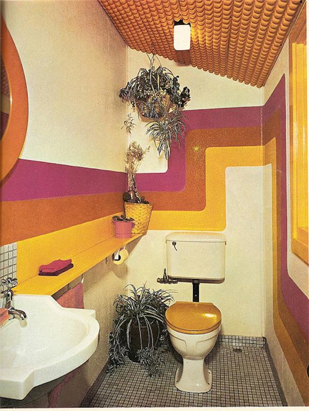 rivestimenti-bagno-vintage-arredamento-stile-anni-60-pareti-colorate-decorazione-piante-lavabo-bianco-classico
