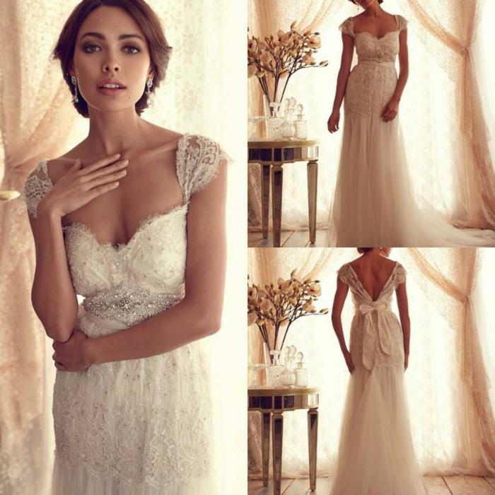 elegantný vintage model čipkovaných svadobných šiat s výstrihom a stuhou a rukávmi s čapicou