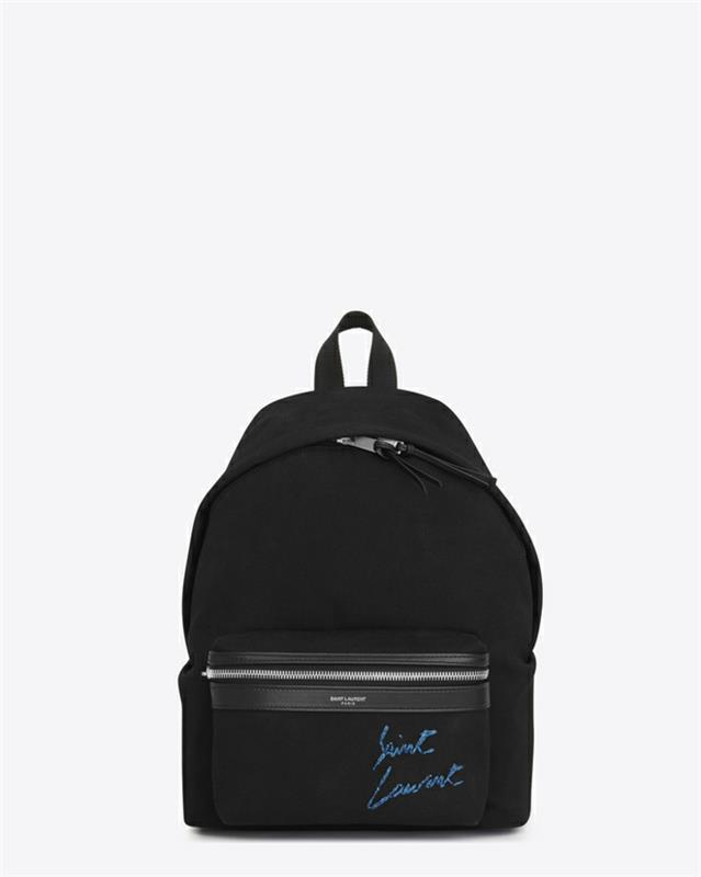 svart ryggsäck med Yves Saint Laurent -logotyp och signatur i elblått att bära med jeans och sneakers