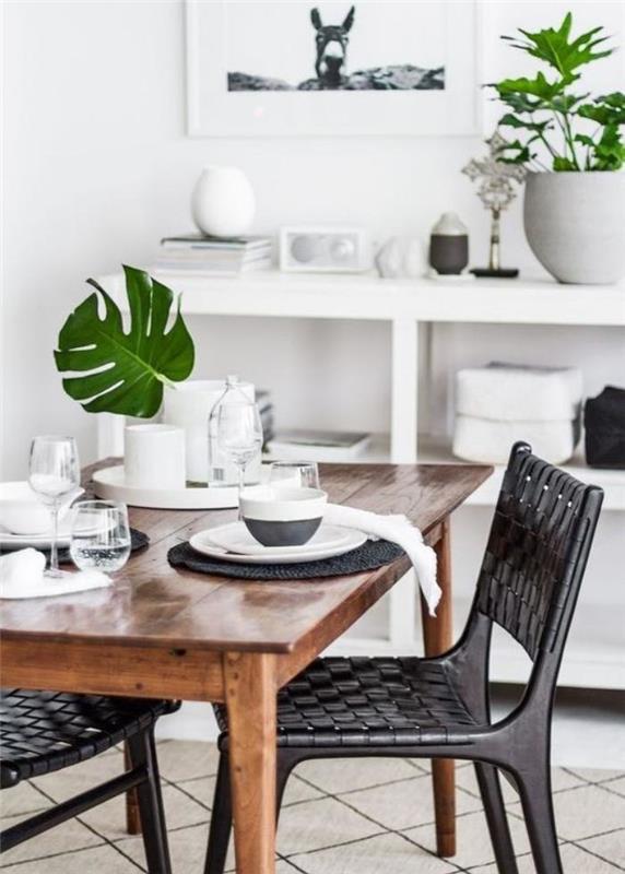 Škandinávska jedáleň-čierne pletené stoličky-zelené rastliny