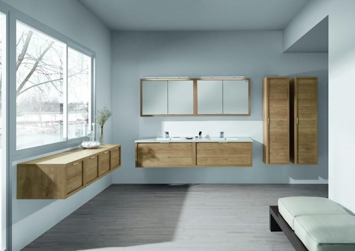 kúpeľňa-vo-svetle-drevo-sivá-podlaha-v-lino-modrej-stene-interiér-okno-drevená-nástenná-skriňa