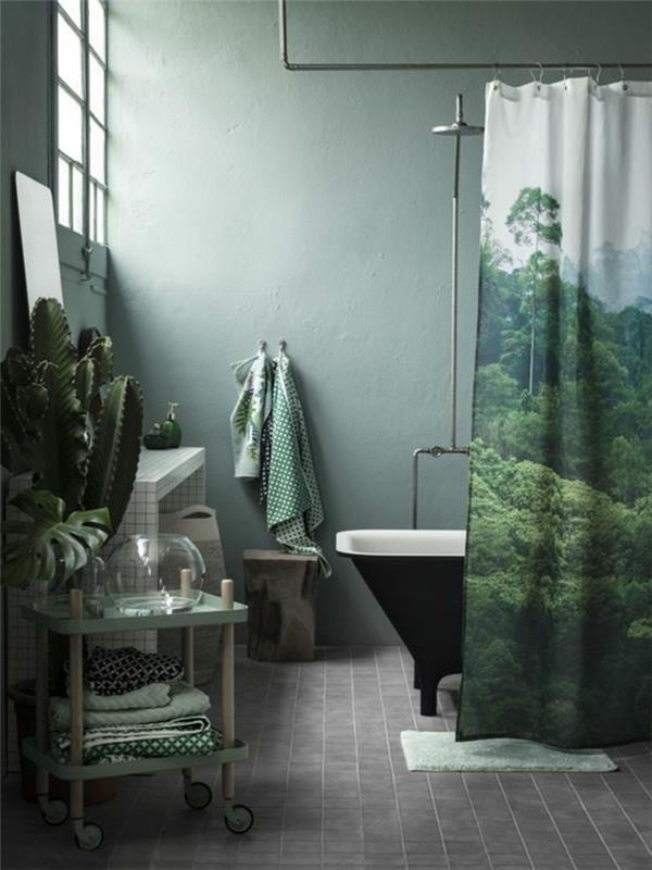 grön-badrum-grå-asfalterad-golv-svart-badkar-ljus-grön-vägg-inomhus-grön-växt