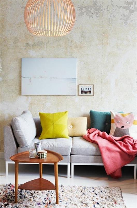 šik-obývacia izba-béžová-pohovka-dekoratívne-vankúše-farebný-koberec-drevený-obývacia-stôl