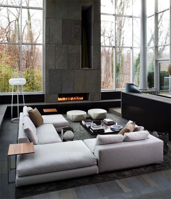 deco loft dizajn veľká moderná obývacia izba s krbom a arkýřovým oknom