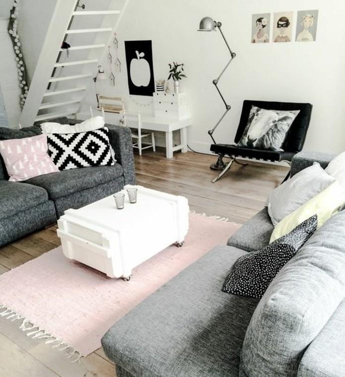 obývačka-sivý-a-biely-dizajn-veľmi-zaujímavá-farebná-maľba-obývačka-biela-pohovky-sivá-akcenty-ružová