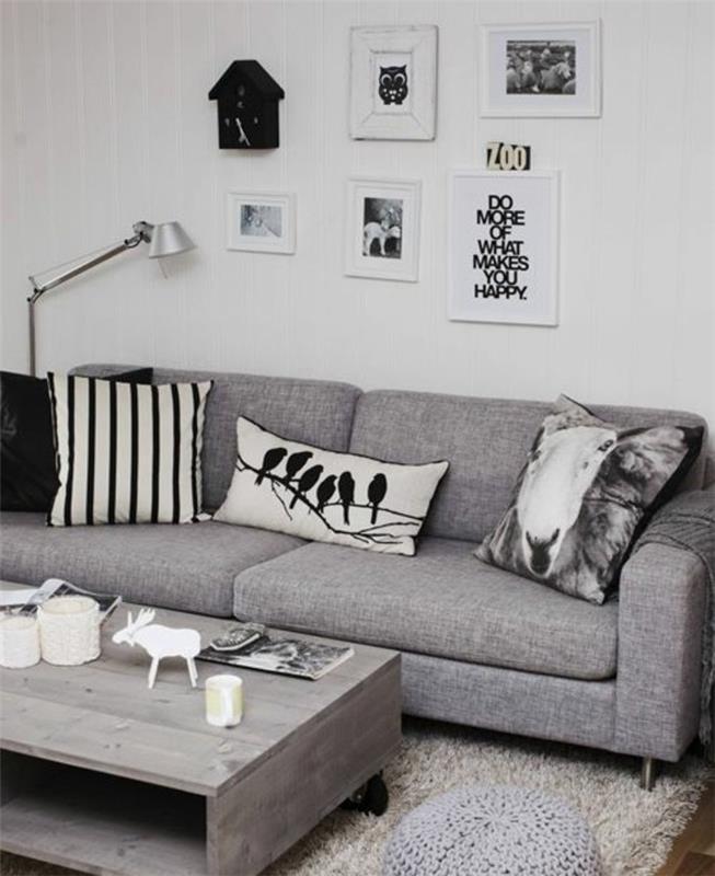 Skandinávska obývačka-nápad-na-sivobielu-obývaciu izbu-nádherná-šedá-sedačka-sivá-pohovka-drevený-stôl-desing-na-kolieskach-farba-farby-obývačka-biela