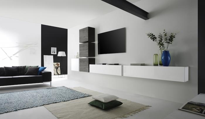 moderná obývacia izba s dizajnovou poličkou a obývacím nábytkom na dekoráciu minimálna obývacia izba škandinávsky štýl čierna a biela