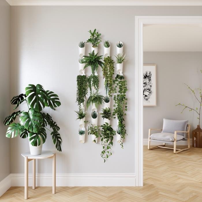 exempel hur man gör en väggdekoration med gröna växter, minimalistiskt vardagsrum i grått och trä med gröna växter