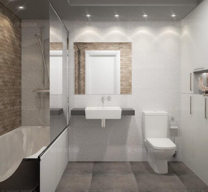 sivá podlaha do kúpeľne s veľkým obkladom, WC v kúpeľni s bielymi kachľami, béžová dláždená sprcha