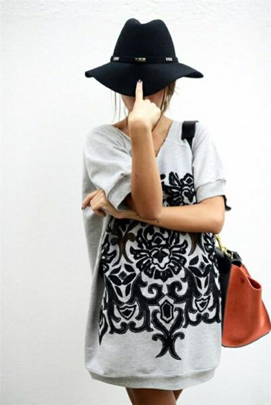 tröja-kvinna-svart-filt-hatt-läder-handväska
