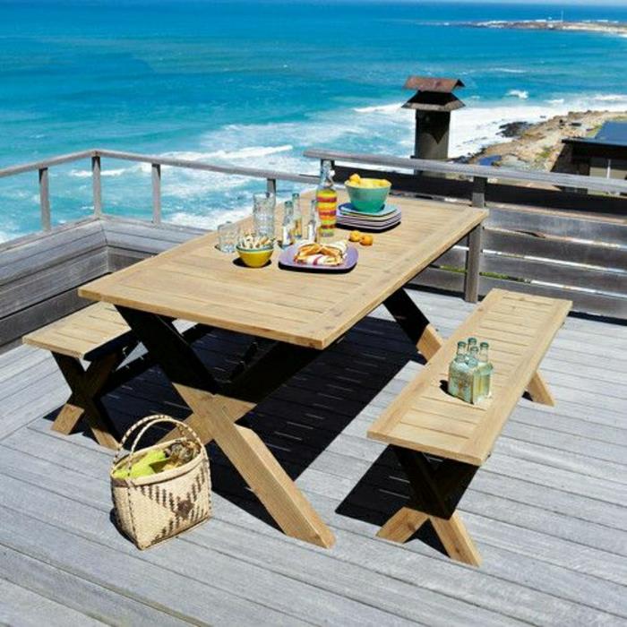 bord-med-bänk-trä-trädgård-bord-vacker-utsikt-mot-havet-stranden