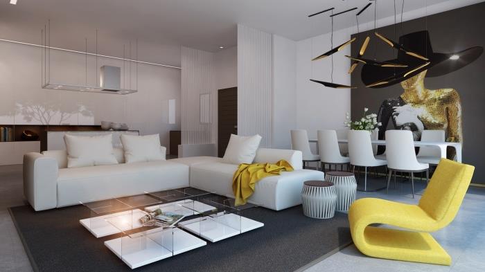 moderný interiérový dizajn v štúdiu, výzdoba obývačky otvorená do jedálne so sivou podlahou a bielymi stenami s horčicovými ozdobnými predmetmi