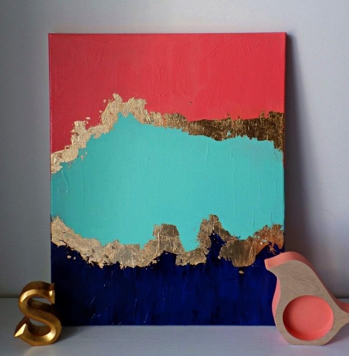 modern geode akrylmålning i rött, blått och guld, abstrakt akrylmålning i vardagsrumsinredning