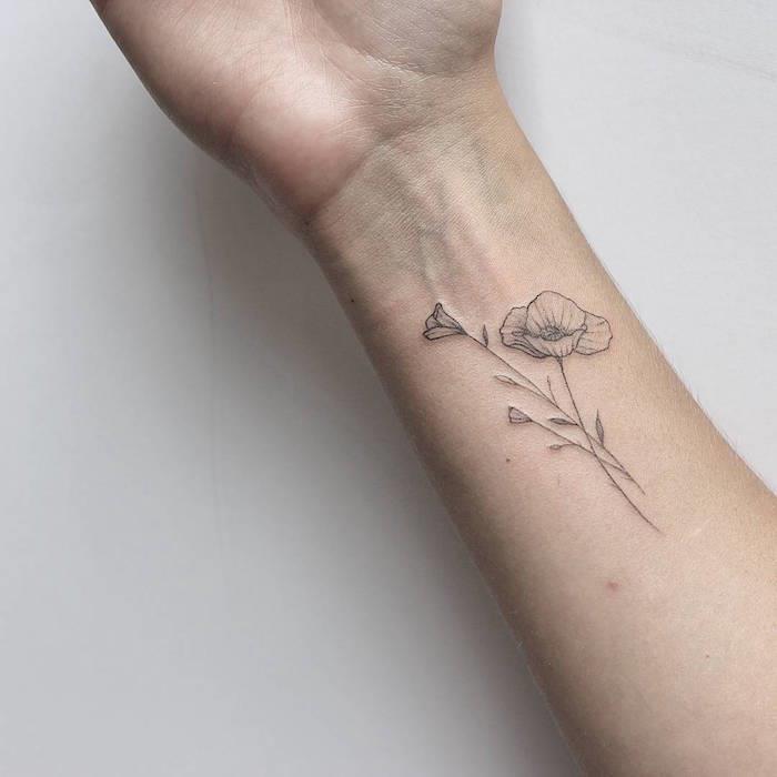 vallmo tatuering betyder tatuering blomma svart diskret handled